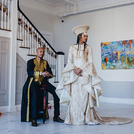 A couple poses in the 1845 Gathering Room at Revel 32°